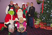 agents by christmas tree at Toys for Tots